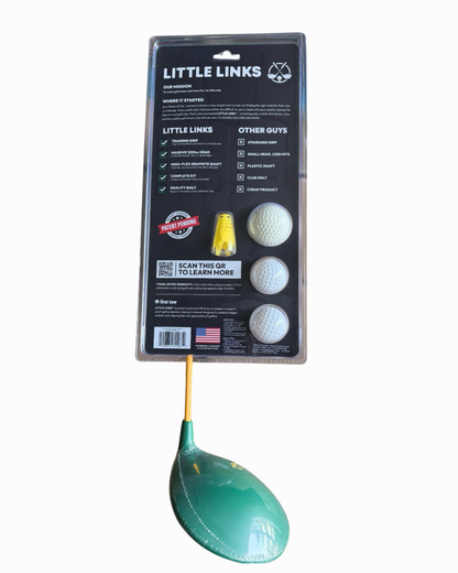 Back view of the Little Links Big Swing Kids Golf Driver packaging in green, showing included training grip, plastic golf balls, and tees, designed to help kids learn golf in a fun and confidence-building way.