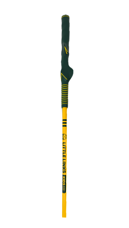 Close-up of a green Little Links kids golf driver training grip with yellow accents, designed to guide proper hand placement and help young golfers learn correct technique.